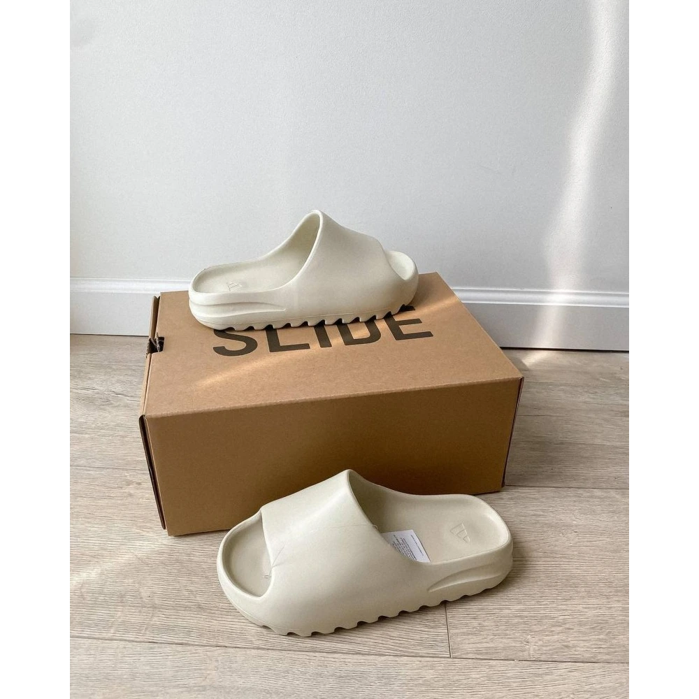 32-ADIDAS-YEEZY-SLIDES-BONE-1599-1.webp